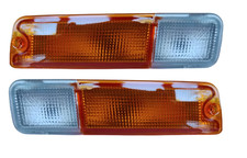 SET 2 FANALE FANALINO FRECCIA ANTERIORE SX DX PER L200 96 05 CON PORTALAMPADA