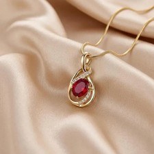Collana con ciondolo solitario taglio ovale rubino simulato placcato oro giallo 14 kt
